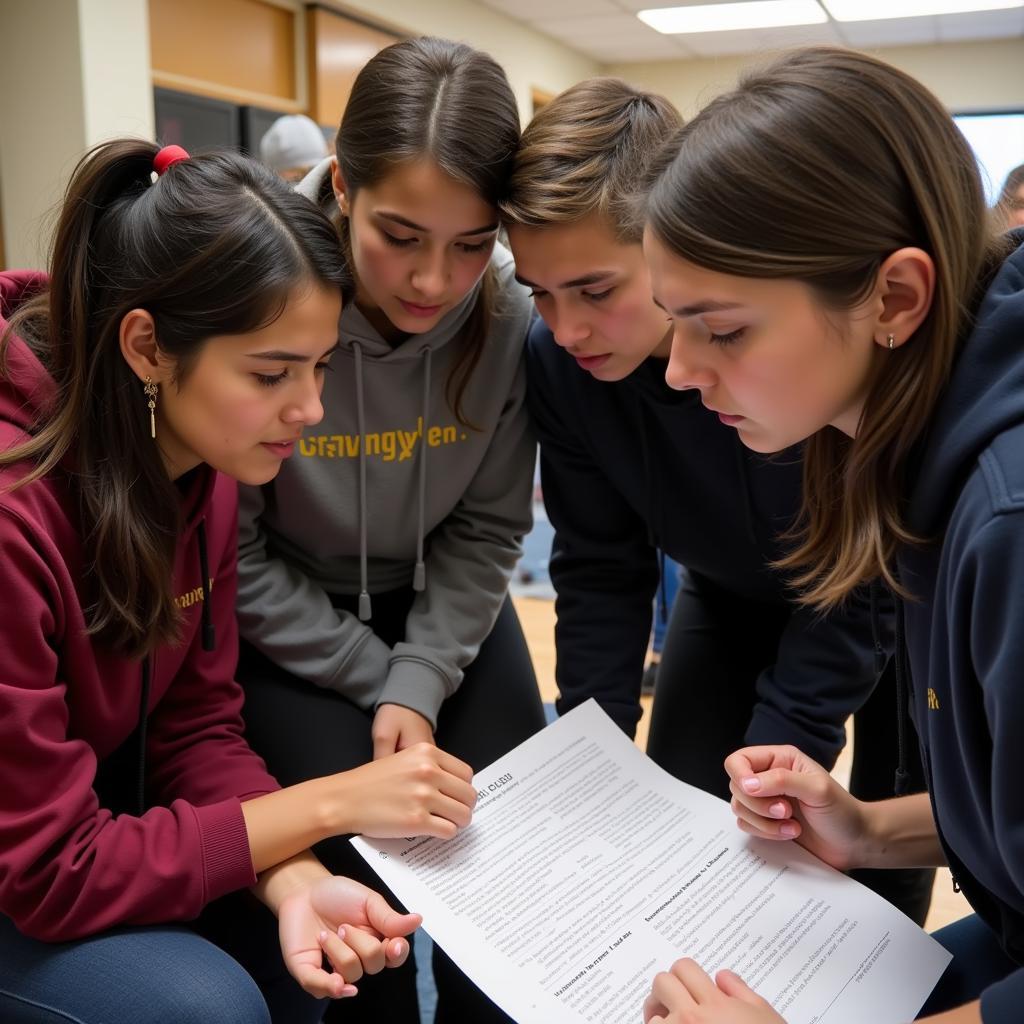 Students reviewing university admissions information